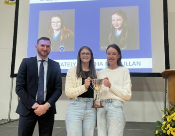 Maria Gately and Éabha Mc Mullan are jointly awarded the Cassidy Cup for traditional music