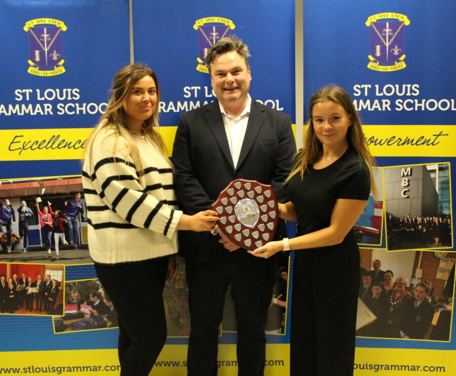 Erin Donnelly-McAuley and Anna Barry receiving John Stuart Shield for Services to School Community